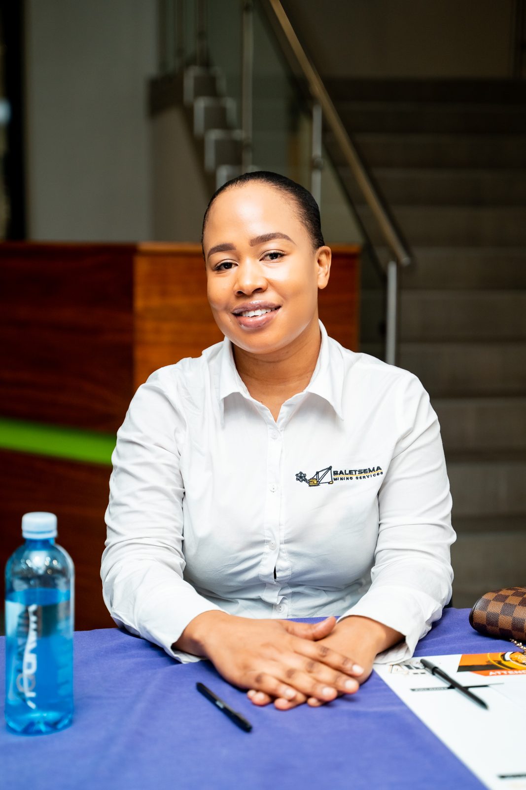 Host at the delegate registration desk