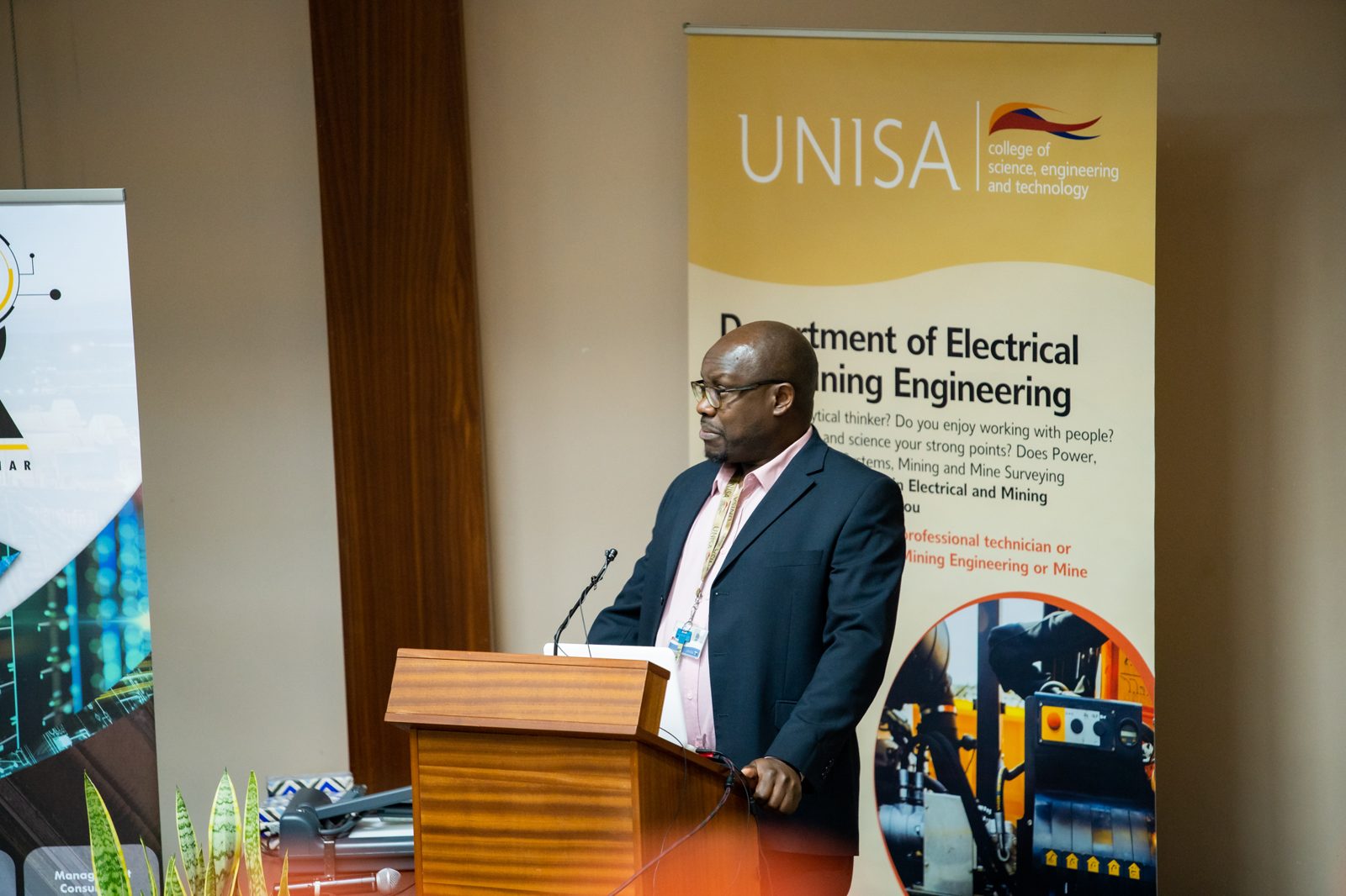 Speaker delivering the opening address at the UNISA lecture podium